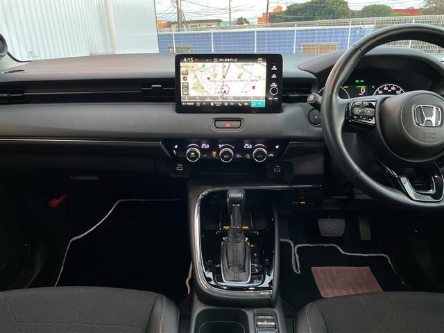 ヴェゼル ｅ：ＨＥＶ　Ｚ　ワンオーナー／純正９インチナビ／全方位カメラ／地デジＴＶ／ＢＴ／クルーズコントロール／純正ＯＰグリル／純正ＯＰプレミアムオーディオ／純正１８インチアルミホイール／ワイヤレス充電／ＥＴＣ２．０／ドラレコ（12枚目）