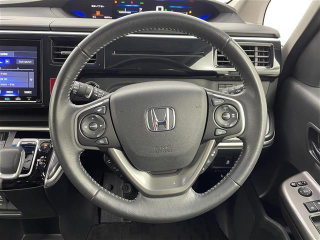 ステップワゴンスパーダ スパーダハイブリッド　Ｇ・ＥＸ　ホンダセンシング　純正９インチナビ（ＣＤ・ＤＶＤ・フルセグ・ＢＴ・ＳＤ・ＵＳＢ）バックカメラ　社外前方ドライブレコーダー　ビルトインＥＴＣ　両側パワースライドドア　前席シートヒーター　ホンダセンシング（8枚目）