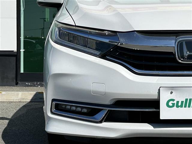 シャトル ハイブリッドZ ホンダセンシング ビルトインETC ホンダセンシング レーダークルーズコントロール 革巻きステアリング パドルシフト ステアリングスイッチ LEDヘッドライト フォグランプ オートライト ハーフレザーシート(20枚目)