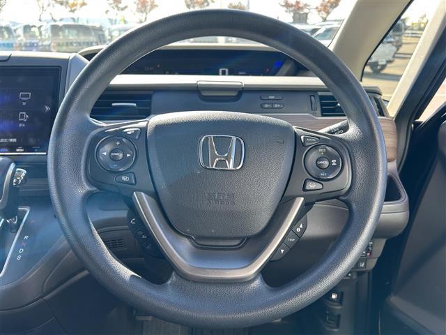 フリード Ｇ・ホンダセンシング　純正ナビ　フルセグＴＶ　Ｂカメ　両側電動扉　衝突軽減　クルコン　横滑り防止機能　アイドリングストップ　ドラレコ　ＥＴＣ　シートヒーター　ＬＥＤヘッド　オートライト（6枚目）