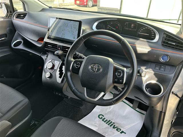 シエンタ ハイブリッドG 社外10インチフローティングナビ バックカメラ 両側パワースライドドア モデリスタエアロ 運転席シートヒーター 革巻きステアリング ステアリングスイッチ 衝突軽減カメラ 車線逸脱防止機能 クルコン(21枚目)