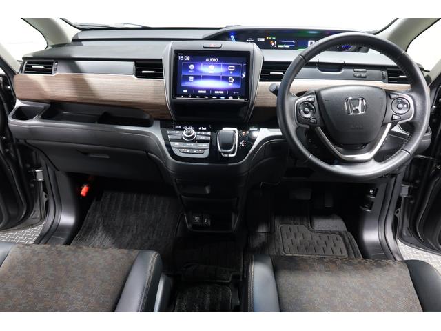 フリードハイブリッド ハイブリッド・クロスターホンダセンシング ホンダ認定中古車/ワンオーナー/ドラレコ/ナビ/フルセグ/Bluetooth/CD.DVD再生可/両側パワースライドドア/シートヒーター/ETC/LEDヘッドライト/衝突軽減ブレーキ/ホンダセンシング(9枚目)