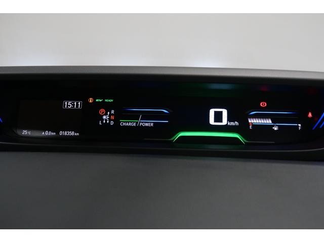 フリードハイブリッド ハイブリッド・クロスターホンダセンシング ホンダ認定中古車/ワンオーナー/ドラレコ/ナビ/フルセグ/Bluetooth/CD.DVD再生可/両側パワースライドドア/シートヒーター/ETC/LEDヘッドライト/衝突軽減ブレーキ/ホンダセンシング(13枚目)