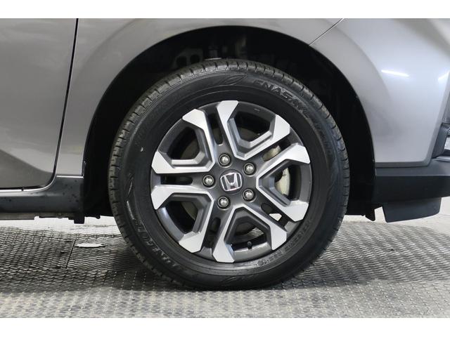 フリードハイブリッド ハイブリッド・クロスターホンダセンシング ホンダ認定中古車/ワンオーナー/ドラレコ/ナビ/フルセグ/Bluetooth/CD.DVD再生可/両側パワースライドドア/シートヒーター/ETC/LEDヘッドライト/衝突軽減ブレーキ/ホンダセンシング(27枚目)