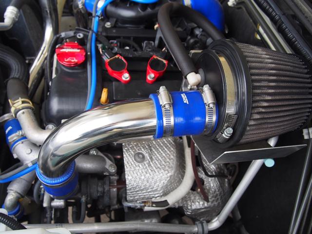 ジムニー XC 5MT リフトアップカスタム JAOSフロントバンパー タニグチリアバンパー エンジンルームタニグチ フジツボマフラー WORKホイール RT185タイヤ(15枚目)