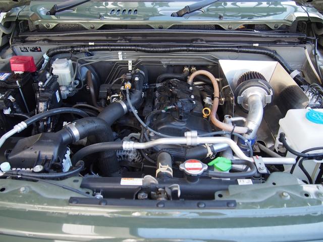 ジムニー XC 4AT リフトアップ DAMDグリル 前後ハイブリバンパー サイド出しマフラー WORKアルミ ジオランダーAT4タイヤ(13枚目)