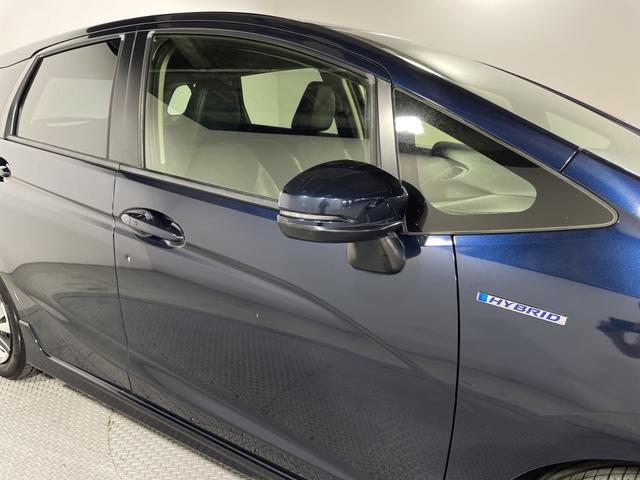 シャトル ハイブリッドＸ　純正ナビ　バックカメラ　ＥＴＣ　パドルシフト　クルーズコントロール　衝突軽減　オートライト　ＬＥＤヘッドライト　純正フロアマット　スマートキー　ハーフレザーシート　ＣＤ　ＴＶ　純正ホイールキャップ（64枚目）