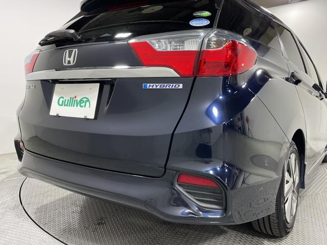 シャトル ハイブリッドＸ　純正ナビ　バックカメラ　ＥＴＣ　パドルシフト　クルーズコントロール　衝突軽減　オートライト　ＬＥＤヘッドライト　純正フロアマット　スマートキー　ハーフレザーシート　ＣＤ　ＴＶ　純正ホイールキャップ（72枚目）