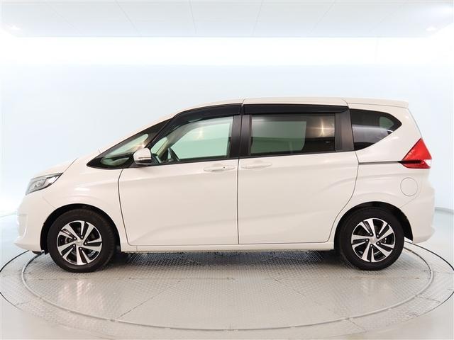 フリード Ｇ・ホンダセンシング　１年間走行無制限保証　ペダル踏み間違い　衝突回避被害軽減　車線逸脱警報機能　メモリナビ　フルセグＴＶ　バックカメラ　ＥＴＣ　クルーズコントロール　電動スライドドア　ＬＥＤヘッドライト　ＤＶＤ再生（3枚目）