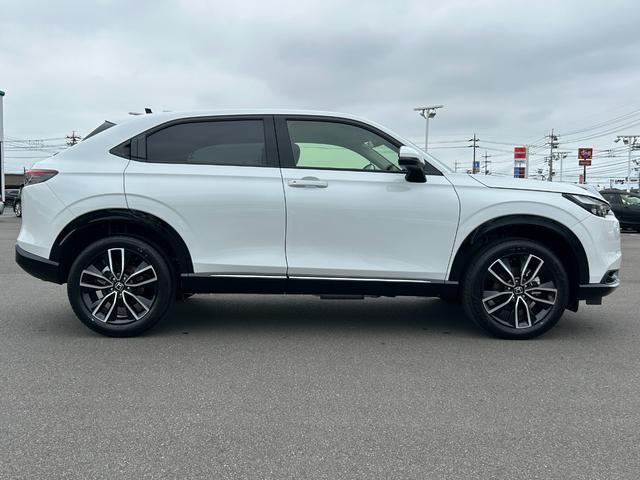 ヴェゼル ｅ：ＨＥＶ　Ｚ　登録済未使用車　純正ナビ　バックカメラ　ＥＴＣ２．０　ＢＳＭ　シートヒーター　ステアリングヒーター　クリアランスソナー　衝突軽減　レーダークルーズ　レーンキープ　ダウンヒルアシスト　１８インチ純正ＡＷ（70枚目）