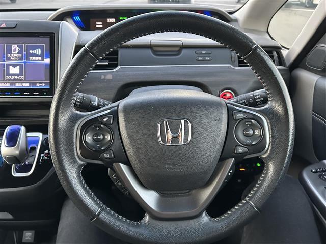 フリードハイブリッド ハイブリッド・ＥＸ　ワンオーナー　純正９型ナビ　純正１２．８型フリップダウンモニター　バックカメラ　両側パワスラ　ＥＴＣ　ホンダセンシング　レーダークルーズ　衝突軽減　シートヒーター　１５インチ純正ＡＷ　純正フロアマット（14枚目）