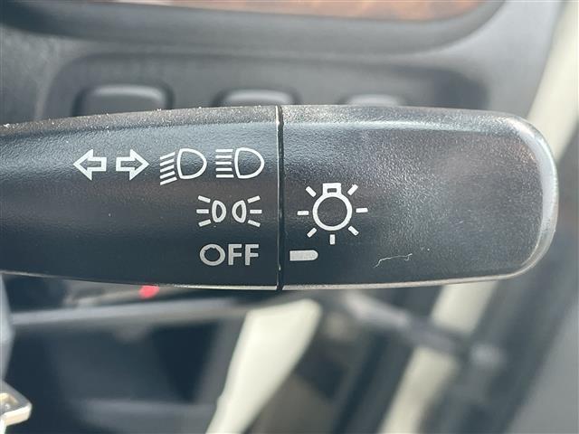 ミラジーノ ジーノ　禁煙車　５速ＭＴ　社外オーディオ　ＥＴＣ　ブラウンウッドインテリア　ウッドコンピステアリング　ハーフレザーシート　電動格納ミラー　メカニカルキー　スペアキー　純正ホイールカバー　取扱説明書　保証書（9枚目）