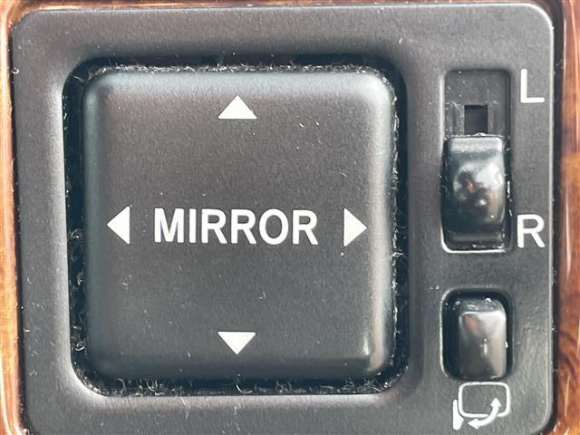 ミラジーノ ジーノ　禁煙車　５速ＭＴ　社外オーディオ　ＥＴＣ　ブラウンウッドインテリア　ウッドコンピステアリング　ハーフレザーシート　電動格納ミラー　メカニカルキー　スペアキー　純正ホイールカバー　取扱説明書　保証書（14枚目）