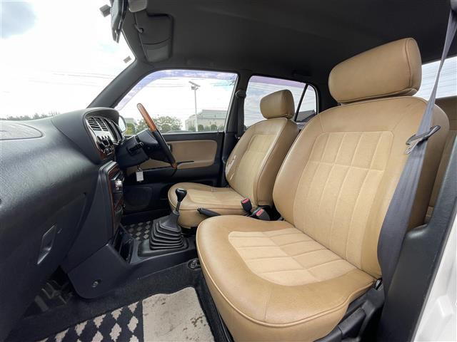 ミラジーノ ジーノ　禁煙車　５速ＭＴ　社外オーディオ　ＥＴＣ　ブラウンウッドインテリア　ウッドコンピステアリング　ハーフレザーシート　電動格納ミラー　メカニカルキー　スペアキー　純正ホイールカバー　取扱説明書　保証書（21枚目）