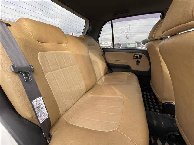 ミラジーノ ジーノ　禁煙車　５速ＭＴ　社外オーディオ　ＥＴＣ　ブラウンウッドインテリア　ウッドコンピステアリング　ハーフレザーシート　電動格納ミラー　メカニカルキー　スペアキー　純正ホイールカバー　取扱説明書　保証書（26枚目）