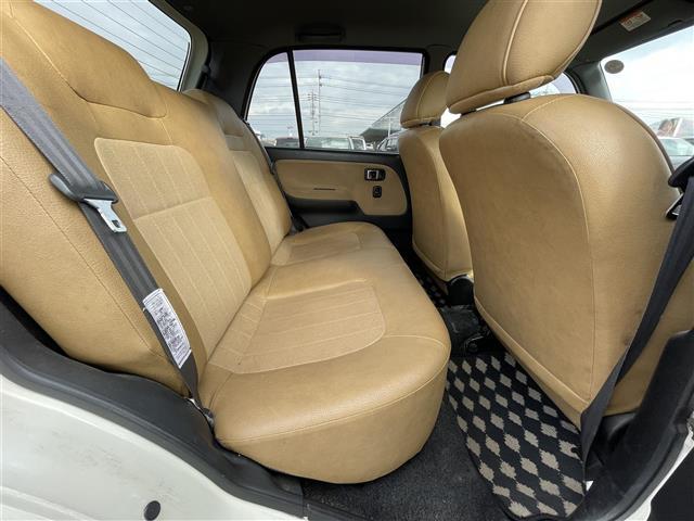 ミラジーノ ジーノ　禁煙車　５速ＭＴ　社外オーディオ　ＥＴＣ　ブラウンウッドインテリア　ウッドコンピステアリング　ハーフレザーシート　電動格納ミラー　メカニカルキー　スペアキー　純正ホイールカバー　取扱説明書　保証書（27枚目）