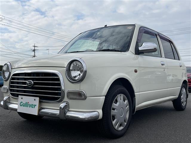 ミラジーノ ジーノ　禁煙車　５速ＭＴ　社外オーディオ　ＥＴＣ　ブラウンウッドインテリア　ウッドコンピステアリング　ハーフレザーシート　電動格納ミラー　メカニカルキー　スペアキー　純正ホイールカバー　取扱説明書　保証書（32枚目）