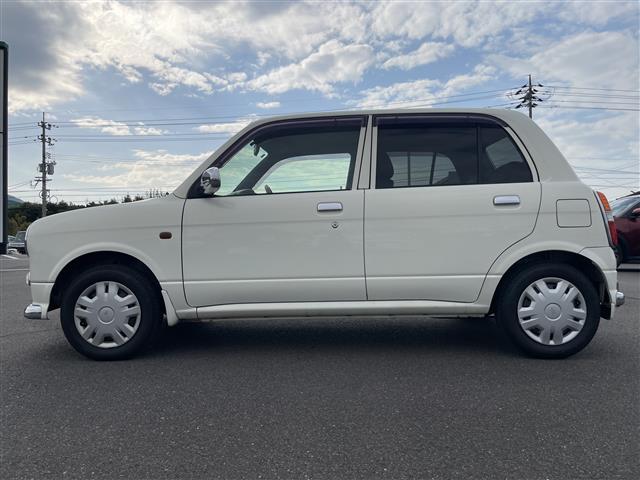 ミラジーノ ジーノ　禁煙車　５速ＭＴ　社外オーディオ　ＥＴＣ　ブラウンウッドインテリア　ウッドコンピステアリング　ハーフレザーシート　電動格納ミラー　メカニカルキー　スペアキー　純正ホイールカバー　取扱説明書　保証書（33枚目）