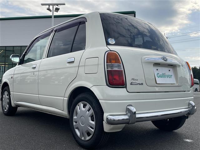 ミラジーノ ジーノ　禁煙車　５速ＭＴ　社外オーディオ　ＥＴＣ　ブラウンウッドインテリア　ウッドコンピステアリング　ハーフレザーシート　電動格納ミラー　メカニカルキー　スペアキー　純正ホイールカバー　取扱説明書　保証書（36枚目）