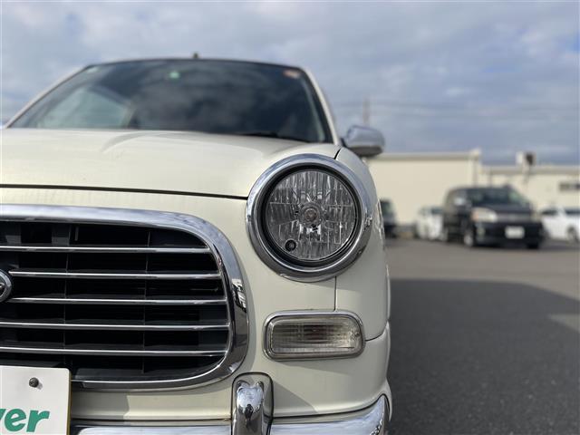 ミラジーノ ジーノ　禁煙車　５速ＭＴ　社外オーディオ　ＥＴＣ　ブラウンウッドインテリア　ウッドコンピステアリング　ハーフレザーシート　電動格納ミラー　メカニカルキー　スペアキー　純正ホイールカバー　取扱説明書　保証書（39枚目）