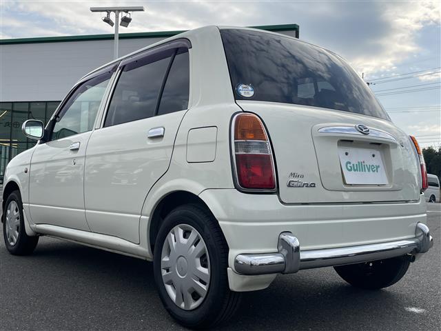 ミラジーノ ジーノ　禁煙車　５速ＭＴ　社外オーディオ　ＥＴＣ　ブラウンウッドインテリア　ウッドコンピステアリング　ハーフレザーシート　電動格納ミラー　メカニカルキー　スペアキー　純正ホイールカバー　取扱説明書　保証書（43枚目）