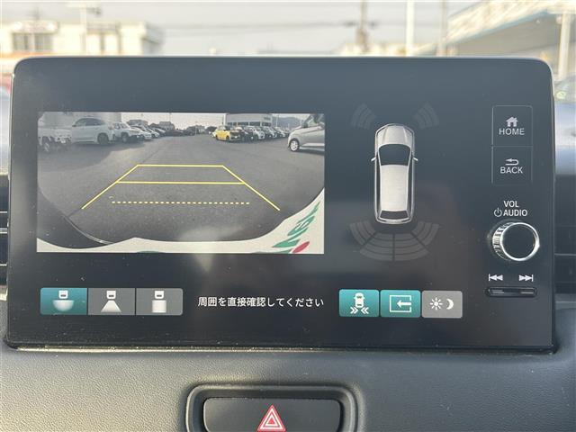 ヴェゼル ｅ：ＨＥＶ　Ｚ　純正９インチナビ（ＡＭ／ＦＭ／ＣａｒＰｌａｙ／ＴＶ／ＢＴ）　バックカメラ　ハーフレザーシート　Ｄ／Ｎ席シートヒーター　ホンダセンシング　衝突軽減ブレーキ　アダプティブクルーズコントロール　ＢＳＭ（2枚目）