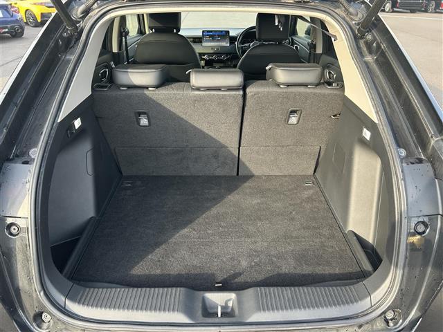ヴェゼル ｅ：ＨＥＶ　Ｚ　純正９インチナビ（ＡＭ／ＦＭ／ＣａｒＰｌａｙ／ＴＶ／ＢＴ）　バックカメラ　ハーフレザーシート　Ｄ／Ｎ席シートヒーター　ホンダセンシング　衝突軽減ブレーキ　アダプティブクルーズコントロール　ＢＳＭ（32枚目）