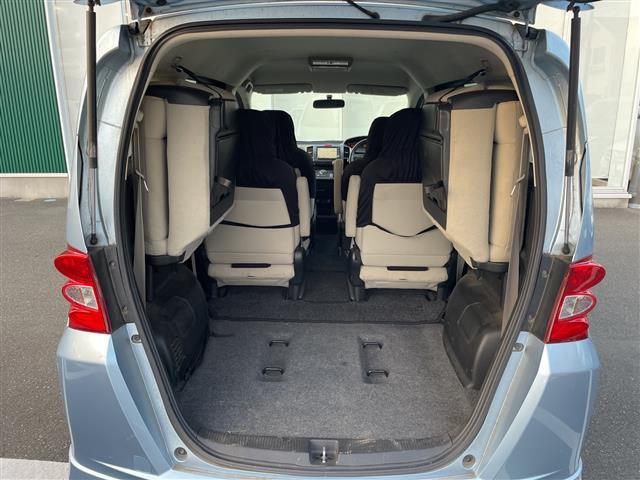 フリード G エアロ Lパッケージ 純正ナビ ワンセグTV Gathers製後席フリップダウンモニター 片側パワースライドドア バックカメラ ETC 純正アルミホイール 純正フロアマット 電動格納ミラー ドアバイザー(8枚目)