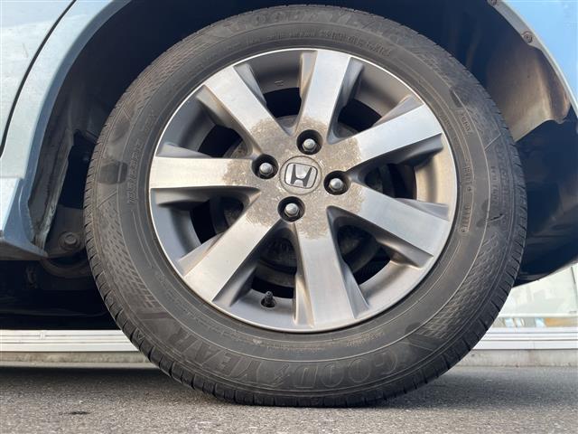 フリード G エアロ Lパッケージ 純正ナビ ワンセグTV Gathers製後席フリップダウンモニター 片側パワースライドドア バックカメラ ETC 純正アルミホイール 純正フロアマット 電動格納ミラー ドアバイザー(9枚目)