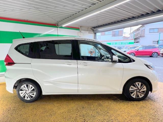 フリード Ｇ・ホンダセンシング　禁煙　衝突軽減ブレーキ　社外ＳＤナビ　Ｂｌｕｅｔｏｏｔｈ　バックモニター　フルセグ　ＥＴＣ　両側自動ドア（5枚目）