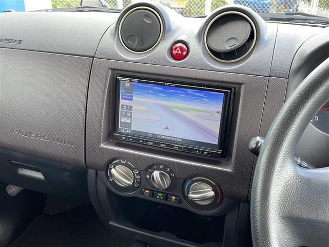 パジェロミニ ＸＲ　社外ナビＣＮ－ＲＥ０５Ｄ　フルセグＴＶ　ＣＤ／ＤＶＤ再生　Ｂｌｕｅｔｏｏｔｈオーディオ　ＳＤカード録音　ＡＭ／ＦＭラジオ　ＡＣ　キーレス　電動格納ドアミラー　レザー調シートカバー（Ｃｌａｚｚｉｏ）（13枚目）
