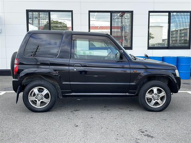 パジェロミニ ＸＲ　社外ナビＣＮ－ＲＥ０５Ｄ　フルセグＴＶ　ＣＤ／ＤＶＤ再生　Ｂｌｕｅｔｏｏｔｈオーディオ　ＳＤカード録音　ＡＭ／ＦＭラジオ　ＡＣ　キーレス　電動格納ドアミラー　レザー調シートカバー（Ｃｌａｚｚｉｏ）（35枚目）