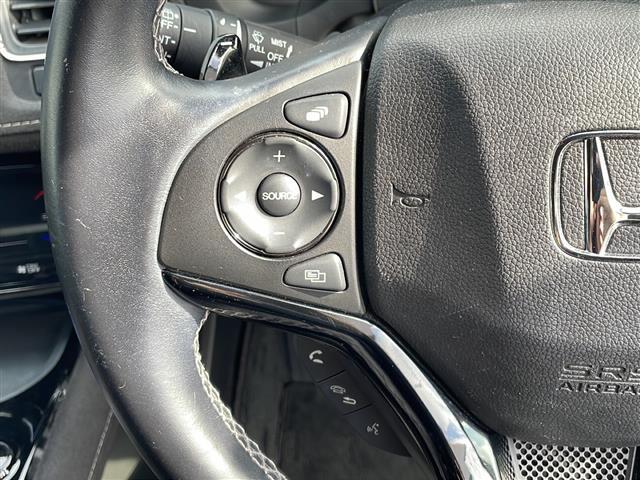 ヴェゼル ハイブリッドＲＳ・ホンダセンシング　純正８インチナビ　フルセグＴＶ　ＥＴＣ　ドラレコ　ホンダセンシング　車線維持支援システム　路外逸脱抑制機能　歩行者事故低減ステアリング　標識認識機能　先行車発進お知らせ機能　衝突軽減ブレーキ　純正ＡＷ（10枚目）