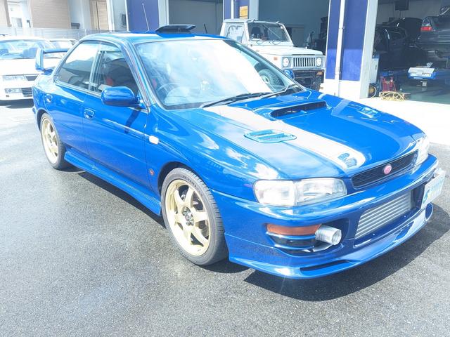 インプレッサ ＷＲＸ　ＳＴｉバージョンＩＩＩ　Ｖリミテッド　５５５台限定車　純正５速ＭＴ　ＷＯＲＫゴールドアルミホイール　パワーＦＣ　Ａ´ＰＥＸパワーインテーク　追加メーター　前置きインタークーラー　ＳＡＲＤフロントパイプ　社外マフラー（26枚目）