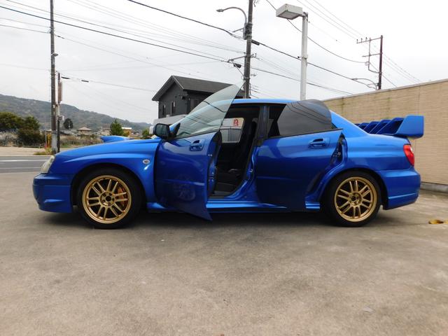 インプレッサ ＷＲＸ　ＳＴｉ　６速マニュアル　ＷＲＣレプリカ大型リヤスポイラー　レイズ１７インチアルミホイール　ＥＴＣ　メモリーナビ　ドライブレコーダー　社外マフラ　ＳＴｉフォグカバー（25枚目）