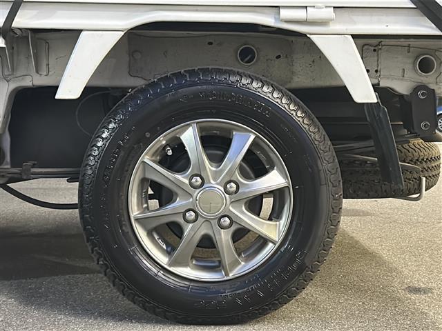 ミニキャブトラック G 禁煙車/4WD/レーダーブレーキサポート/5MT/パワーステアリング/パワーウィンドゥ/AC/ドアバイザー/フォグランプ/荷室灯/スタッドレス/スペアタイヤ/後方コーナーセンサー/横滑り防止装置(27枚目)
