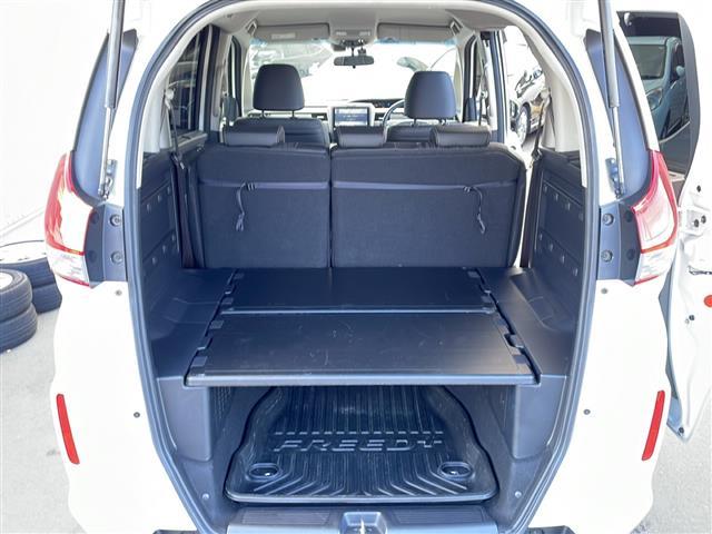 フリード＋ハイブリッド ハイブリッドＥＸ　禁煙車／純正ナビ（ＣＤ／ＤＶＤ／フルセグＴＶ／Ｂｌｕｅｔｏｏｔｈ）／バックカメラ／ビルトインＥＴＣ／シートヒーター／ドライブレコーダー／両側パワースライドドア／革巻きステアリング（14枚目）