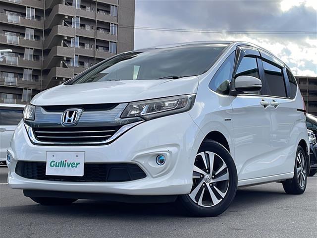 フリード＋ハイブリッド ハイブリッドＥＸ　禁煙車／純正ナビ（ＣＤ／ＤＶＤ／フルセグＴＶ／Ｂｌｕｅｔｏｏｔｈ）／バックカメラ／ビルトインＥＴＣ／シートヒーター／ドライブレコーダー／両側パワースライドドア／革巻きステアリング（17枚目）