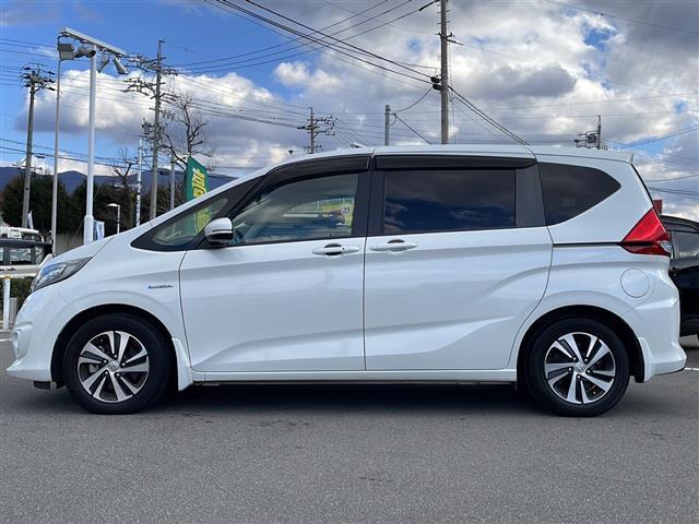 フリード＋ハイブリッド ハイブリッドＥＸ　禁煙車／純正ナビ（ＣＤ／ＤＶＤ／フルセグＴＶ／Ｂｌｕｅｔｏｏｔｈ）／バックカメラ／ビルトインＥＴＣ／シートヒーター／ドライブレコーダー／両側パワースライドドア／革巻きステアリング（18枚目）