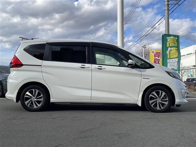 フリード＋ハイブリッド ハイブリッドＥＸ　禁煙車／純正ナビ（ＣＤ／ＤＶＤ／フルセグＴＶ／Ｂｌｕｅｔｏｏｔｈ）／バックカメラ／ビルトインＥＴＣ／シートヒーター／ドライブレコーダー／両側パワースライドドア／革巻きステアリング（22枚目）