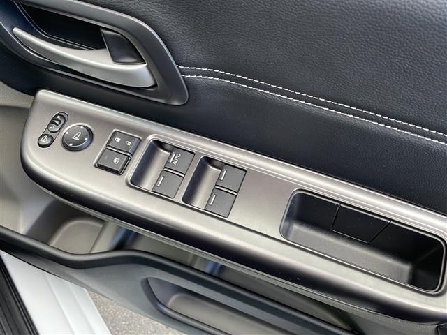 フリード＋ハイブリッド ハイブリッドＥＸ　禁煙車／純正ナビ（ＣＤ／ＤＶＤ／フルセグＴＶ／Ｂｌｕｅｔｏｏｔｈ）／バックカメラ／ビルトインＥＴＣ／シートヒーター／ドライブレコーダー／両側パワースライドドア／革巻きステアリング（29枚目）