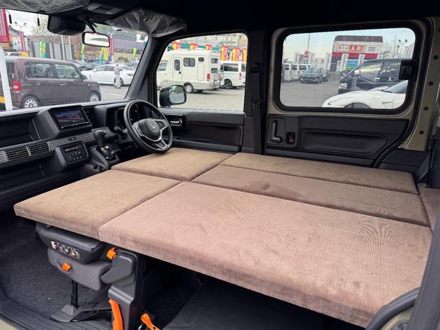 N-VAN+スタイル ファン キャンピング仕様 AtoZアメリアワン 18L冷蔵庫 サブバッテリー インバーター 外部電源 集中電源スイッチ リア固定テーブル メモリナビ バックカメラ フルセグTV レーダークルーズコントロール(8枚目)