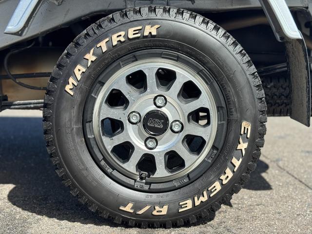 ハイゼットトラック ジャンボエクストラ　メモリナビ　フルセグＴＶ　Ｂｌｕｅｔｏｏｔｈ　スマートキー　ＬＥＤヘッドライト　クリアランスソナー　ＭＡＤＣＲＯＳＳ１２インチアルミ　フォグランプ　　衝突軽減ブレーキ　ＤＶＤ再生　　１オーナー　禁煙車（34枚目）
