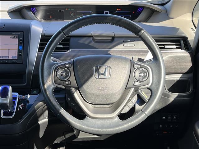 フリードハイブリッド ハイブリッド・ＥＸ　純正ナビ（フルセグ／ＢＴ／ＣＤ／ＤＶＤ）／レーダークルーズコントロール／バックカメラ／衝突軽減／レーンキープ／両側パワスラ／ハーフレザー／シートヒーター／後席サンシェード／前後ドラレコ／ＥＴＣ（22枚目）