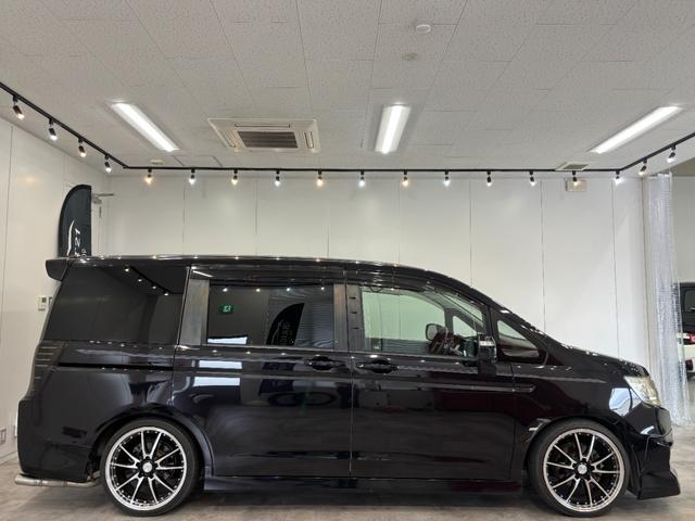 ステップワゴンスパーダ S ユーザー買取 ETC バックカメラ ナビ TV 両側電動スライドドア HID キーレスエントリー 電動格納ミラー 3列シート CVT CD DVD再生 記録簿 盗難防止システム 衝突安全ボディ(18枚目)