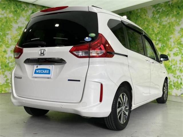 フリードハイブリッド ハイブリッドＧホンダセンシング　保証書／純正　９インチ　ＳＤナビ／フリップダウンモニター　純正　１１．６インチ／ホンダセンシング／両側電動スライドドア／シートヒーター　前席／車線逸脱防止支援システム／シート　ハーフレザー　ＤＶＤ再生（3枚目）