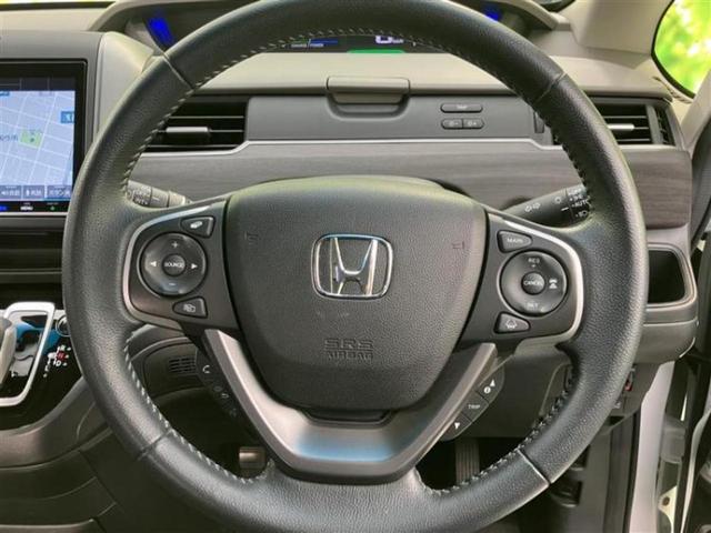 フリードハイブリッド ハイブリッドＧホンダセンシング　保証書／純正　９インチ　ＳＤナビ／フリップダウンモニター　純正　１１．６インチ／ホンダセンシング／両側電動スライドドア／シートヒーター　前席／車線逸脱防止支援システム／シート　ハーフレザー　ＤＶＤ再生（16枚目）