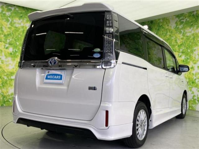 ヴォクシー ハイブリッドV 純正エアロ/保証書/純正 SDナビ/フリップダウンモニター/両側電動スライドドア/シートヒーター/ヘッドランプ LED/ETC/EBD付ABS/横滑り防止装置/アイドリングストップ/フルセグTV(3枚目)