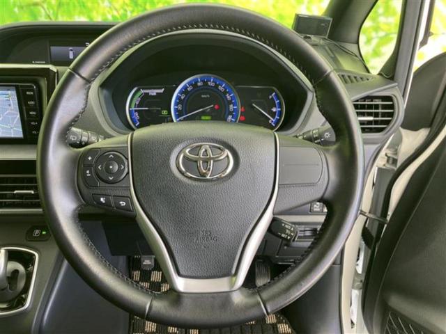 ヴォクシー ハイブリッドV 純正エアロ/保証書/純正 SDナビ/フリップダウンモニター/両側電動スライドドア/シートヒーター/ヘッドランプ LED/ETC/EBD付ABS/横滑り防止装置/アイドリングストップ/フルセグTV(14枚目)