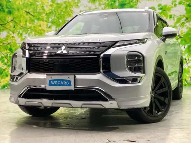 アウトランダーＰＨＥＶ ４ＷＤ　Ｐ　新品タイヤ／サンルーフ／ＢＯＳＥ／保証書／純正　ＳＤナビ／衝突安全装置／シートヒーター／全方位モニター／車線逸脱防止支援システム／シート　合皮／電動バックドア／ヘッドランプ　ＬＥＤ　全周囲カメラ（3枚目）